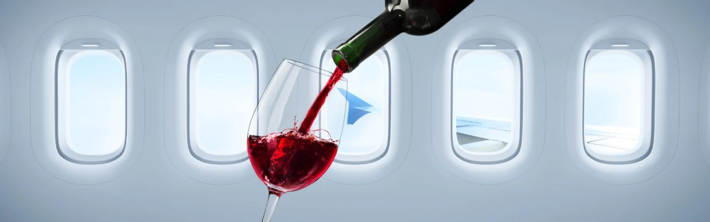 red wine is poured inside the cabin of airplane